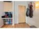 Entryway with wood floors, a coat rack, and a built-in coffee bar at 860 Peachtree Ne St # 904, Atlanta, GA 30308