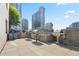 Outdoor rooftop grilling and BBQ area with condo views at 860 Peachtree Ne St # 904, Atlanta, GA 30308