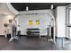 Weight lifting machines and dumbbell racks in the community gym area at 860 Peachtree Ne St # 904, Atlanta, GA 30308