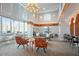 Community lounge area with high ceilings, comfortable seating, and large windows at 860 Peachtree Ne St # 904, Atlanta, GA 30308