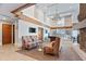 Community lounge area with high ceilings, comfortable seating, and a fireplace at 860 Peachtree Ne St # 904, Atlanta, GA 30308