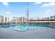 Rooftop outdoor swimming pool with lounge chairs at 860 Peachtree Ne St # 904, Atlanta, GA 30308