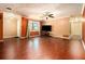 Spacious living room with hardwood floors and neutral color palette at 1239 Sharonton Dr, Stone Mountain, GA 30083