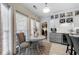 Charming breakfast nook with large windows, white cabinetry, and stylish decor for cozy dining at 3151 Amesbury Way, Duluth, GA 30096