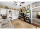 Cozy living room with unique decor, built-in shelving, and comfortable seating at 3151 Amesbury Way, Duluth, GA 30096