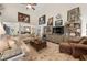 Inviting living space featuring vaulted ceilings, a sectional sofa, and seamless flow to other living areas at 3151 Amesbury Way, Duluth, GA 30096