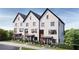Beautiful new construction townhomes with brick facade, dark windows, and manicured landscaping at 651 Soul Aly # 135, Alpharetta, GA 30009