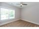 Bedroom featuring carpet, a ceiling fan, and a window with blinds at 1142 Wiley Bridge Rd, Woodstock, GA 30188
