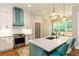 Stylish kitchen featuring quartz countertops, pendant lighting, and an island with bar seating at 1142 Wiley Bridge Rd, Woodstock, GA 30188