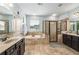 Primary bathroom with soaking tub, glass enclosed shower and double sink vanity with great natural light at 3087 Dunton Se St, Smyrna, GA 30080