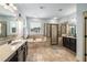 Well lit bathroom with soaking tub, glass enclosed shower and double sink vanity with great natural light at 3087 Dunton Se St, Smyrna, GA 30080
