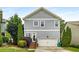 Two-story home with a well-kept lawn, a two-car garage, and appealing curb appeal at 3087 Dunton Se St, Smyrna, GA 30080
