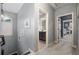 Hallway view with gray walls and open doorway leading to bathroom and primary bedroom at 3087 Dunton Se St, Smyrna, GA 30080