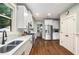 Bright kitchen with stainless steel appliances, tiled backsplash and spacious countertops at 3087 Dunton Se St, Smyrna, GA 30080