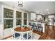 Bright eat-in kitchen featuring bar seating, stainless steel appliances, and natural light at 3087 Dunton Se St, Smyrna, GA 30080