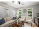 Comfortable living room with a hardwood floors, plenty of natural light, and stylish decor at 3087 Dunton Se St, Smyrna, GA 30080