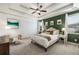 Elegant primary bedroom with trey ceiling, neutral decor, and plenty of natural light at 3087 Dunton Se St, Smyrna, GA 30080