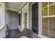 Inviting front porch with comfortable seating and stylish exterior details at 3087 Dunton Se St, Smyrna, GA 30080