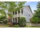 Charming two-story home showcasing a inviting front porch, and well-maintained landscaping at 3087 Dunton Se St, Smyrna, GA 30080