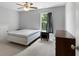 Neutral bedroom featuring carpet and a dark wood nightstand at 42 Treemont Se Dr, Cartersville, GA 30121