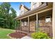 Close-up of the home's front porch showcasing its stone facade and inviting entryway at 42 Treemont Se Dr, Cartersville, GA 30121