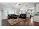 Inviting living room features a vaulted ceiling, hardwood floors, and an open floor plan at 42 Treemont Se Dr, Cartersville, GA 30121