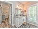 Bright bathroom with granite countertop, undermount sink and access to bedroom at 555 E Valley Ne Rd, Rydal, GA 30171