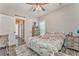 Bedroom with hardwood floors, natural light, and rustic dresser at 555 E Valley Ne Rd, Rydal, GA 30171