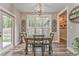 Cozy dining area with natural light and a view of the outdoors at 555 E Valley Ne Rd, Rydal, GA 30171