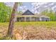 Charming home with a welcoming covered porch and ample outdoor space for relaxation and enjoyment at 555 E Valley Ne Rd, Rydal, GA 30171