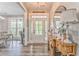 Foyer with wood floors, natural light, and a decorative table at 555 E Valley Ne Rd, Rydal, GA 30171