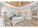 Beautiful bedroom with wood ceiling, showcasing stylish furniture and a tranquil atmosphere at 555 E Valley Ne Rd, Rydal, GA 30171