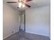 Bedroom with carpet and neutral walls, featuring an open doorway at 5723 Fieldstone Dr, Lithonia, GA 30038