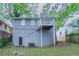 Backyard featuring a deck and partial tree coverage at 941 Reed Ave, Atlanta, GA 30344