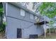 View of the home's backyard featuring a two-story deck at 941 Reed Ave, Atlanta, GA 30344