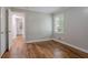 Hallway featuring neutral walls and hardwood floors at 941 Reed Ave, Atlanta, GA 30344