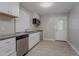 Modern kitchen boasts granite countertops, sleek appliances, and ample cabinet space at 941 Reed Ave, Atlanta, GA 30344