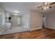 Open layout with eat-in kitchen featuring modern lighting and ceramic tile at 941 Reed Ave, Atlanta, GA 30344