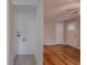 Laundry area next to open floorplan featuring hardwood floors at 941 Reed Ave, Atlanta, GA 30344