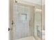 Modern glass shower showcasing gray tiled walls at 1398 Woodland Ave, Atlanta, GA 30316