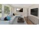 Bright living room with a large window, modern sofa, and stylish decor at 1398 Woodland Ave, Atlanta, GA 30316