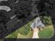Aerial view showing the home with green front and side yards within a black and white neighborhood context at 141 S Fairfield Dr, Peachtree City, GA 30269