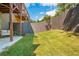 Private backyard with lush green lawn and a seating area, perfect for outdoor enjoyment at 2444 Coosa Vly, Atlanta, GA 30339