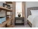 Well lit bedroom with decorative lamp on a side table and bed with decorative pillows at 2444 Coosa Vly, Atlanta, GA 30339