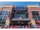 Exterior view of the Right Field Gate entrance showcasing architecture and team branding at 2444 Coosa Vly, Atlanta, GA 30339