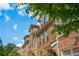 Close-up view of townhome exteriors, showcasing architectural details and landscaping at 2444 Coosa Vly, Atlanta, GA 30339