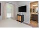 Bright office with large window, modern storage cabinet, and en-suite bathroom access at 2444 Coosa Vly, Atlanta, GA 30339