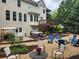 Spacious backyard with a fire pit, patio, hot tub, and upper deck at 365 Autumn Breeze Dr, Roswell, GA 30075