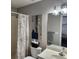 Bathroom with neutral color palette, a tub/shower, and decor at 365 Autumn Breeze Dr, Roswell, GA 30075