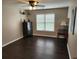 Bedroom featuring hardwood floors, neutral paint, and a ceiling fan at 365 Autumn Breeze Dr, Roswell, GA 30075